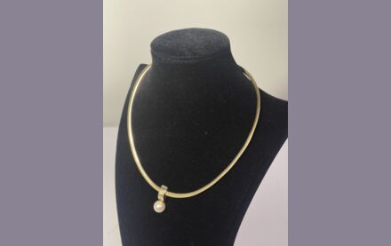 Omega Wende Collier Gold / Silber mit Perle
