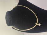 Omega Wende Collier Gold / Silber mit Perle